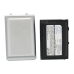 Silver cover beside flat black labeled cell